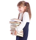 A smiling girl with a huge pile of books Royalty Free Stock Photo