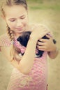 Smiling girl with kitten Royalty Free Stock Photo