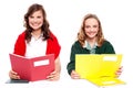 Smiling girl learning from school books Royalty Free Stock Photo