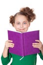Smiling girl look behind book
