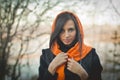 Smiling girl in orange hijab in Dubai Spring