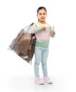 smiling girl with paper garbage in plastic bag