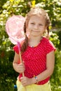 Smiling girl with a pink butterfly net Royalty Free Stock Photo