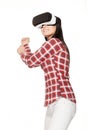 Smiling girl playing sports game in virtual reality. Royalty Free Stock Photo