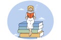 Smiling girl read book sitting on textbooks pile Royalty Free Stock Photo