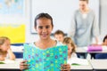 Smiling girl reading book Royalty Free Stock Photo