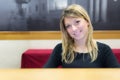 Smiling girl on the reception desk