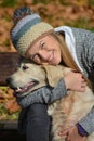 Smiling girl and retriever Royalty Free Stock Photo