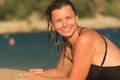 Smiling girl on sandy beach Royalty Free Stock Photo