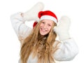 Smiling girl in Santa hat and white mittens