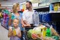 Smiling girl selecting non-alcoholic beverage Royalty Free Stock Photo