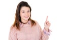 Smiling girl showing empty copy space with her finger Royalty Free Stock Photo