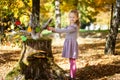 Smiling girl in the autumn park Royalty Free Stock Photo