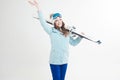 Smiling girl skier on a white background, portrait in the Studio.