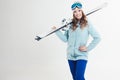 Smiling girl skier on a white background, portrait in the Studio. Royalty Free Stock Photo