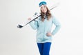Smiling girl skier on a white background, portrait in the Studio. Royalty Free Stock Photo