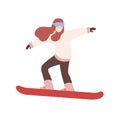 Smiling girl in snowsuit snowboarding. Female snowboarder performing trick. Winter extreme sports and outdoor activity Royalty Free Stock Photo