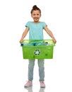 smiling girl sorting plastic waste