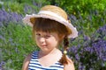 Smiling girl with straw hat in lavender field Royalty Free Stock Photo