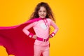 Smiling girl in superhero costume Royalty Free Stock Photo