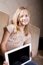 Smiling girl with tablet computer Royalty Free Stock Photo