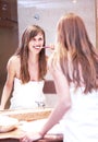 Smiling girl with toothbrush