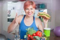 Smiling girl with vegan croissant, healthy lifestyle, weight loss Royalty Free Stock Photo