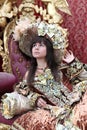 Smiling girl wearing an antique princess dress Royalty Free Stock Photo