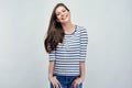 Smiling girl wearing striped casual style shirt