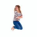 Smiling girl in white blank t-shirt jumping Royalty Free Stock Photo