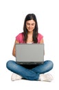 Smiling girl working on laptop Royalty Free Stock Photo