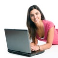 Smiling girl working on laptop Royalty Free Stock Photo