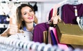 Female shopper boasting her purchases in underwear shop Royalty Free Stock Photo