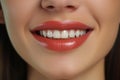 Smiling glossy lips, perfect teeth, dental care concept, female mouth close up.