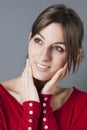 Smiling gorgeous 20s woman touching her face for softness Royalty Free Stock Photo
