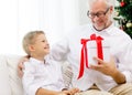 Smiling grandfather and grandson at home Royalty Free Stock Photo