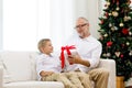 Smiling grandfather and grandson at home Royalty Free Stock Photo