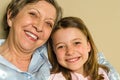 Smiling grandmother and granddaughter