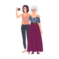 Smiling grandmother and granddaughter standing together and taking selfie on smartphone. Happy old lady and young Royalty Free Stock Photo