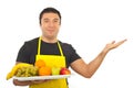 Smiling greengrocer making presentation Royalty Free Stock Photo