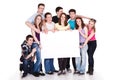 Smiling group of friends with banner Royalty Free Stock Photo