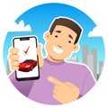 Smiling guy with a phone. Shows the phone screen, points to it with a finger. Bought a car or sold. Red sports car on the phone