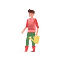 Smiling guy with yellow watering can in hand. Young gardener in striped sweater, pants and rubber boots. Flat vector