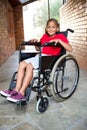 Smiling handicapped boy at school corridor