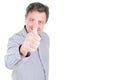 Smiling handsome casual man presenting copy space and making thumbs up ok sign Royalty Free Stock Photo