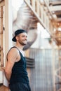 Smiling handsome man on industrial building background Royalty Free Stock Photo