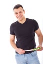 Smiling handsome man with measuring tape Royalty Free Stock Photo