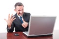 Smiling handsome manager giving number six sign Royalty Free Stock Photo