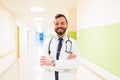 Confident Male Doctor Standing At Hospital Royalty Free Stock Photo