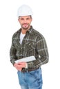 Smiling handyman holding a clipboard Royalty Free Stock Photo